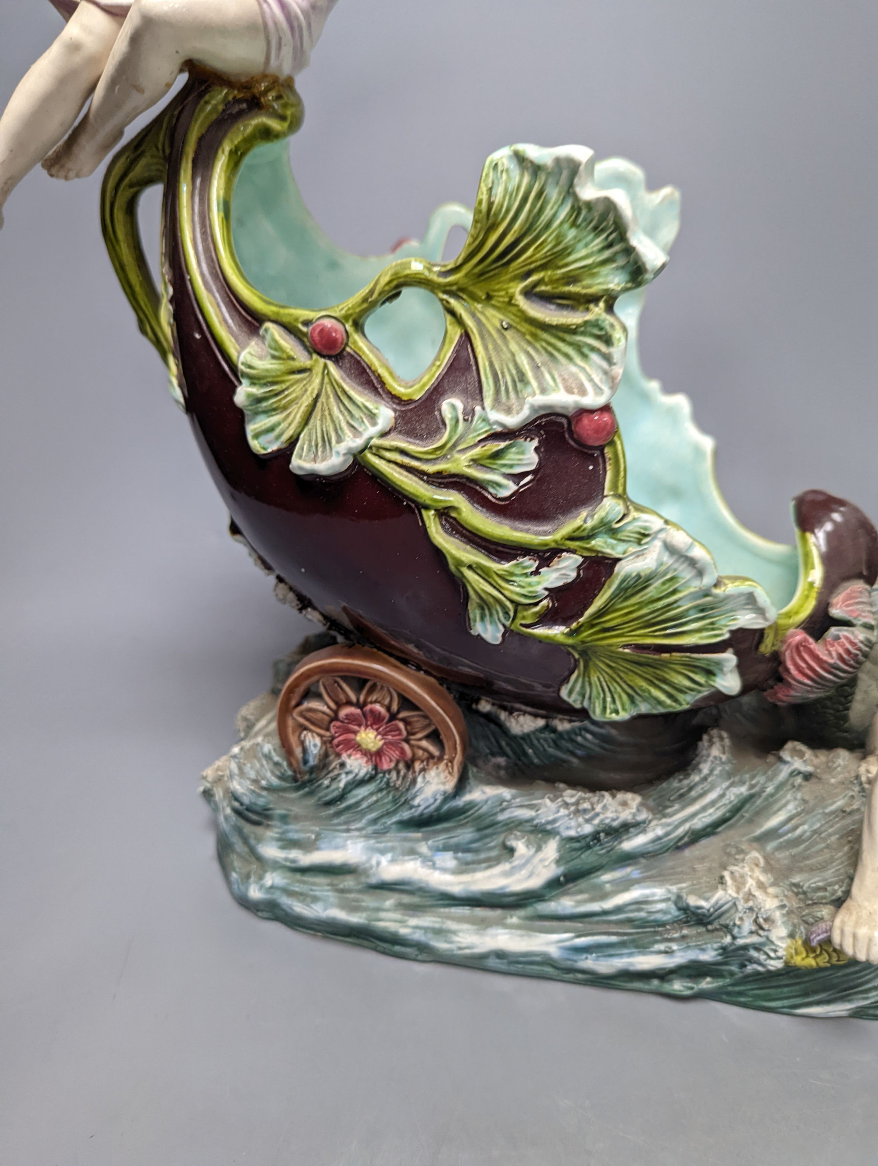 An Austrian or German majolica Triton and nymph figural centrepiece bowl, 39cm tall